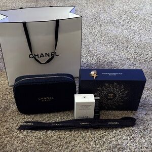 CHANEL navy and gold Beauté gift set with cosmetic pouch